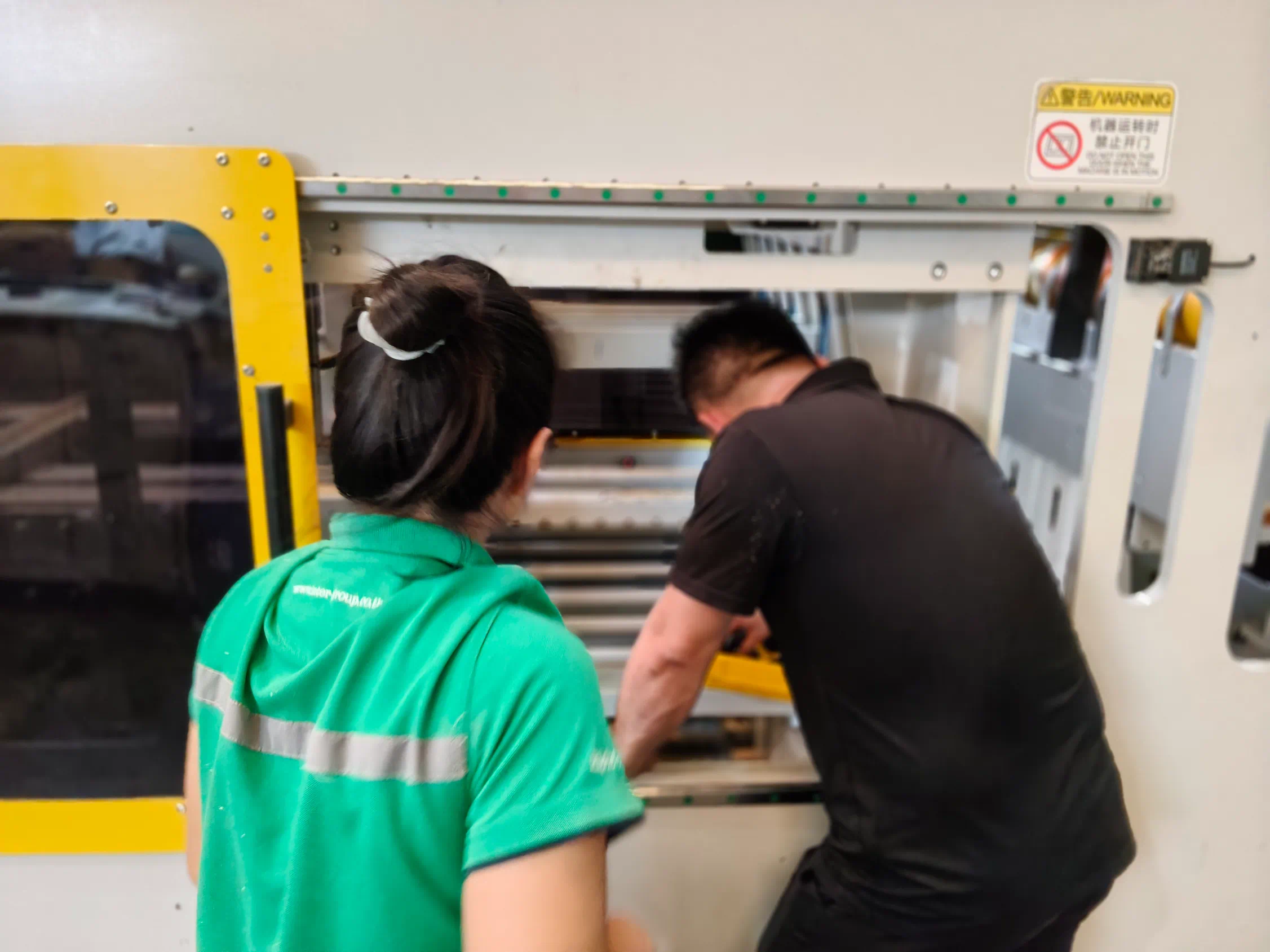 KUNSHAN INDEED after-sales team calibrating the folder gluer at Inter Fiber Container’s Thai factory KUNSHAN INDEED after-sales team calibrating the folder gluer at Inter Fiber Container’s Thai factory